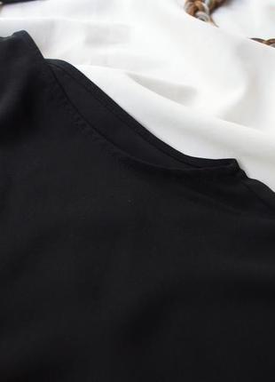 Базова подовжена чорна блуза від h&m v-виріз5 фото