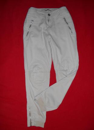 Интересные джинсы terranova  с наколенниками,высокая посадка ,размер s3 фото