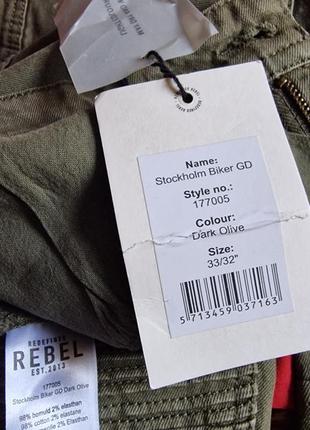 Брендові фірмові демісезонні зимові котонові стрейчеві джинси rebel,нові з бірками,розмір 33/32.8 фото