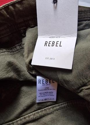Брендові фірмові демісезонні зимові котонові стрейчеві джинси rebel,нові з бірками,розмір 33/32.7 фото