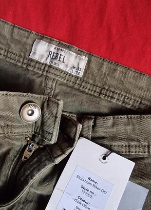 Брендові фірмові демісезонні зимові котонові стрейчеві джинси rebel,нові з бірками,розмір 33/32.5 фото