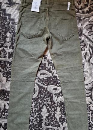 Брендові фірмові демісезонні зимові котонові стрейчеві джинси rebel,нові з бірками,розмір 33/32.2 фото