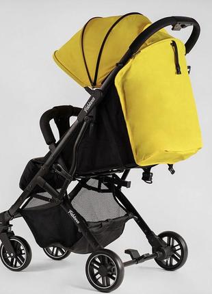 Коляска прогулянкова дитяча "joy" fabiana 73003 (1) колір жовтий, рама сталева, футкавер, підсклянник, телескопічна ручка4 фото