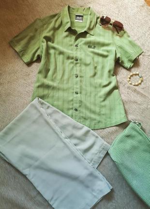 Красивая рубашка приятного зеленого цвета от бренда jack wolfskin.1 фото
