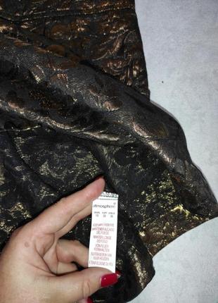 Эффектная юбка из золотистого жаккарда8 фото