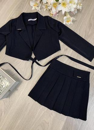 Шкільний — строгий костюм для дівчинки в темно синьому кольорі піджак та спідниця4 фото