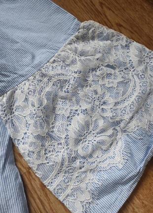 Изысканная свободная блуза с кружевом в мелкую полоску с завязками на спине и укороченными рукавами5 фото