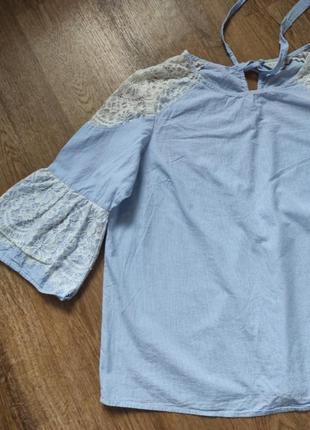 Изысканная свободная блуза с кружевом в мелкую полоску с завязками на спине и укороченными рукавами3 фото