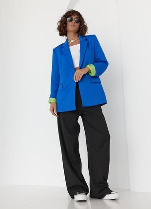 Жіночий піджак з кольоровою підкладкою.2 фото