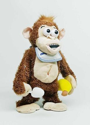 М'яка іграшка shantou "мавпа з бананом" коричнева k60403