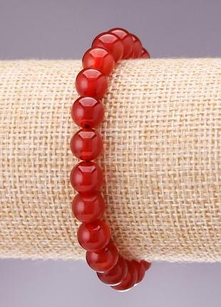 Браслет натуральный камень сердолик гладкий шарик d-8мм l-18см на резинке