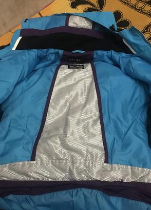 Крутая лыжная куртка, новая с этикетками10 фото