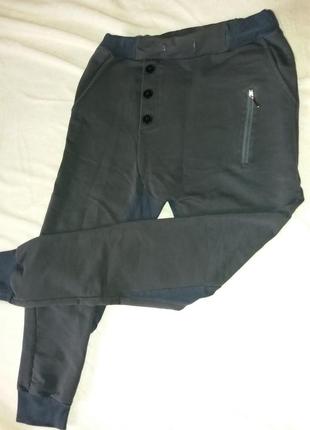 Шикарные штаны с карманами,ассиметрия,42-46разм.,chick rebelle2 фото