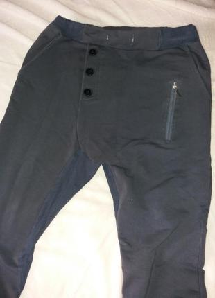 Шикарные штаны с карманами,ассиметрия,42-46разм.,chick rebelle1 фото