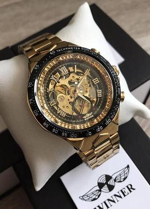 Чоловічий наручний годинник winner gold механіка в коробці1 фото