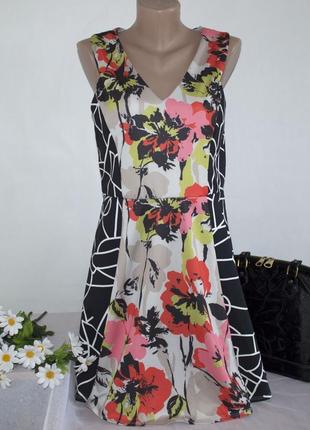 Брендовое разноцветное нарядное миди платье с вырезом на спине miss selfridge марокко1 фото