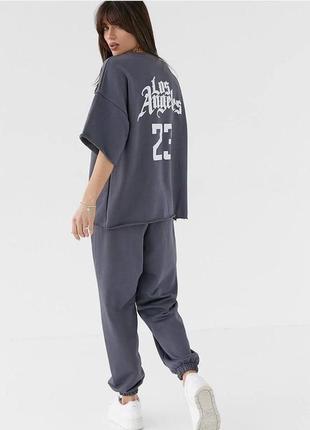 Спортивний костюм лос анджелес los angeles футболка оверсайз з великим принтом на спині штани вільні на манжетах комплект графіт
