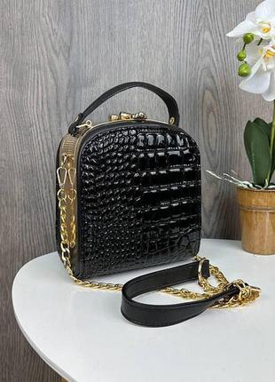 Жіноча міні сумочка рептилія каркасна з замком, маленька сумка золотиста чорний рептилія1 фото