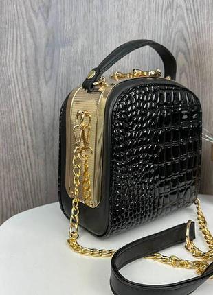 Жіноча міні сумочка рептилія каркасна з замком, маленька сумка золотиста чорний рептилія8 фото