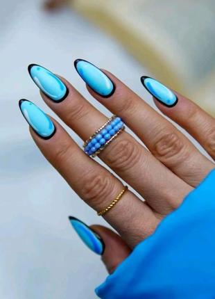 Яскраво-блакитні нігті в стилі 3д зі скотчем