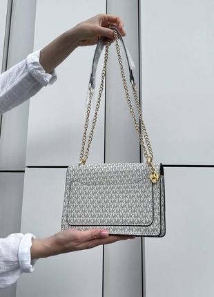 Женская сумка michael kors mini milky6 фото