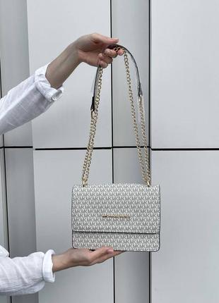 Женская сумка michael kors mini milky2 фото