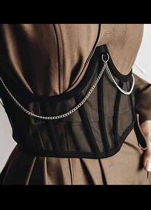 Жіночий чорний декорований корсет на одягу з кисточками прозорий