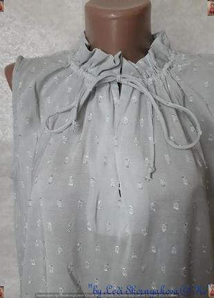 Фирменная h&m блуза серебристого цвета с перфорацией и утяжкой на шее, размер м-л5 фото