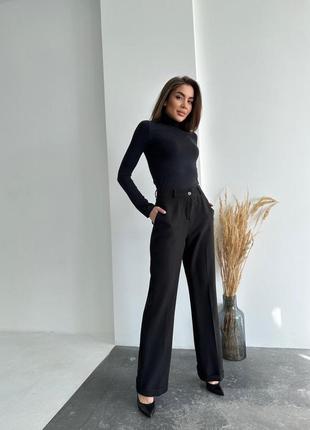 Стильные женские брюки палаццо с широкими штанинами черного цвета классические штаны на высокой посадке2 фото