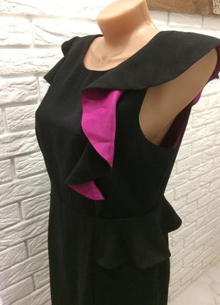 Чорне плаття міні з рюшами і баскою.3 фото