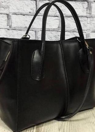 Універсальна шкіряна сумочка для будь-яких випадків