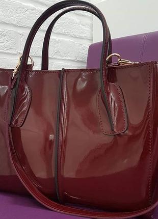 Женская кожаная сумочка цвета марсала7 фото