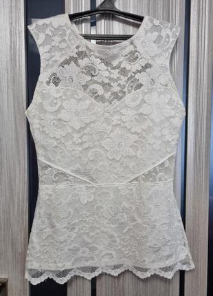 Біла блузка