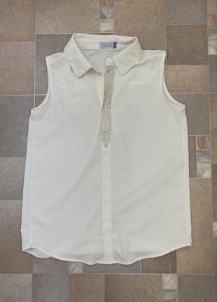 Блуза женская без рукавов.