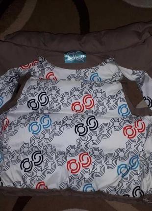 Женская жилетка бренда oq4 фото