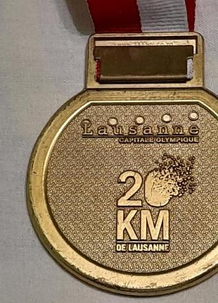 Медаль 20 km de lausanne 30 avril 2011