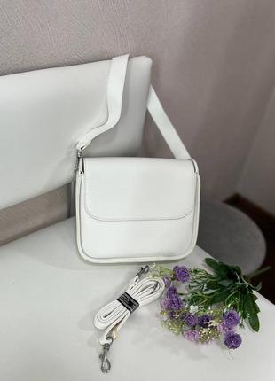 Белая сумка + длинный регулируемый ремешок.1 фото