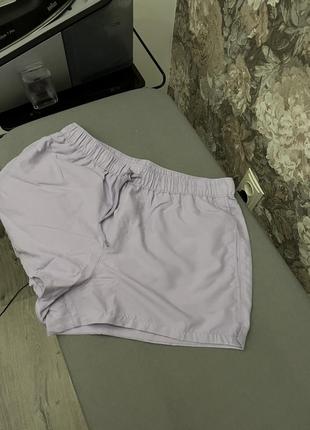 Короткие пляжные плавательные шорты плавки в сиреневый цвет