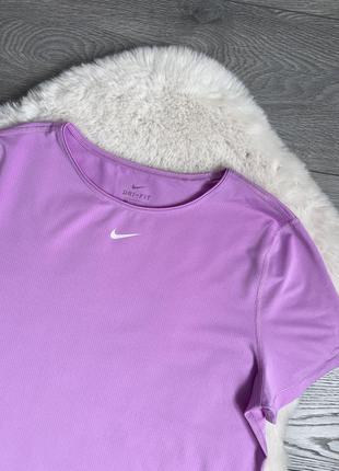 Nike женская фирменная спортивная футболка р. л оригинал3 фото