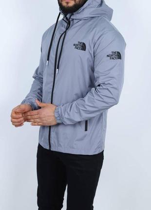 Осеня серая ветровка куртка the north face с капюшоном серая мужская ветровка the north face