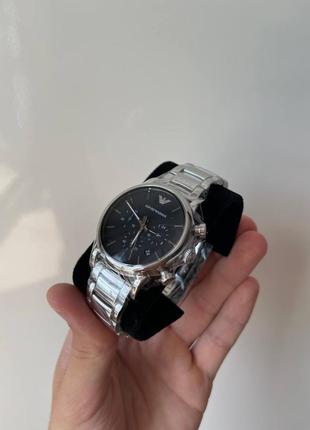 Сріблястий металевий чоловічий годинник з чорним циферблатом emporio armani ar18532 фото