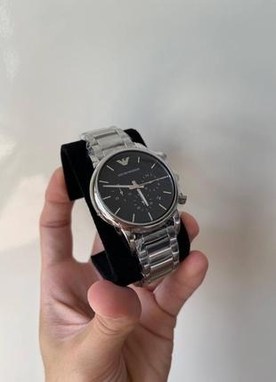 Сріблястий металевий чоловічий годинник з чорним циферблатом emporio armani ar18533 фото