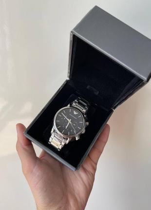 Сріблястий металевий чоловічий годинник з чорним циферблатом emporio armani ar18538 фото