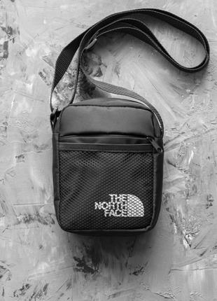 Мужские сумки the north face через плечо барсетка tnf черная тканевая сумка мессендже норт фейс4 фото