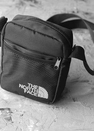 Мужские сумки the north face через плечо барсетка tnf черная тканевая сумка мессендже норт фейс8 фото