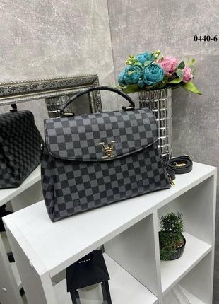 Серая  женская сумка на тонком ремешке .