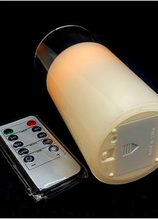 Свеча с led подсветкой с движущимся пламенем и пультом управления (9х7,5х7,5 см)