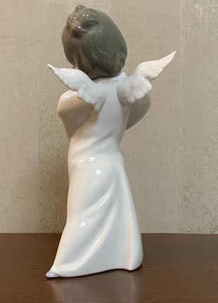 Фарфоровая статуэтка lladro «озадаченный ангел».4 фото