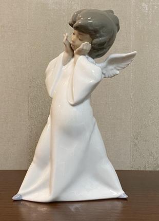 Фарфоровая статуэтка lladro «озадаченный ангел».2 фото