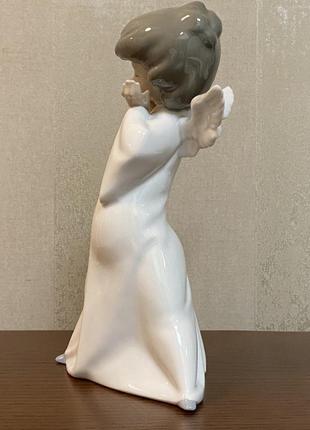 Фарфоровая статуэтка lladro «озадаченный ангел».3 фото